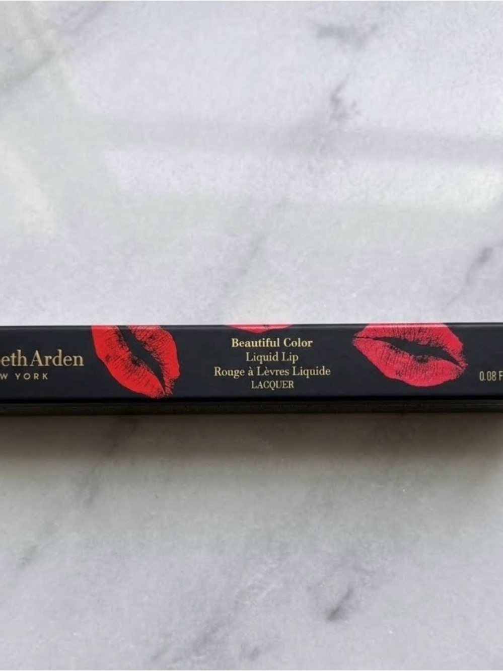 Elizabeth Arden Beautiful Color Liquid Lip Lacquer; color: coral infused